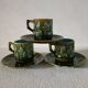 3 cups and saucers in bamboo-decorated earthenware