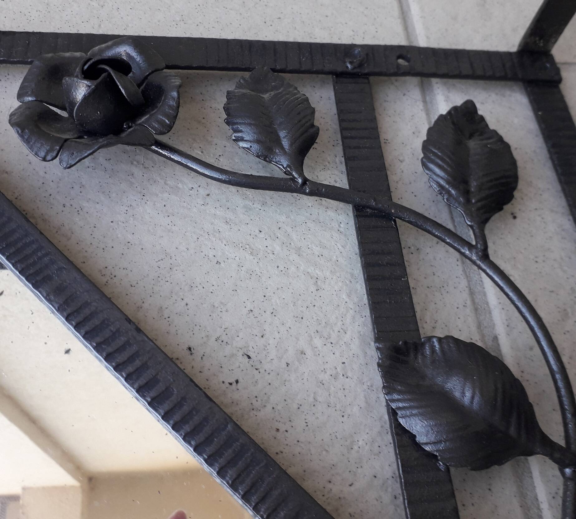 Wrought iron coat rack