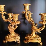 Paire de bougeoirs chandeliers flambeaux anciens en bronze doré époque XIXe