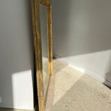 Golden mirror style Restoration decorated with stretched palmettes