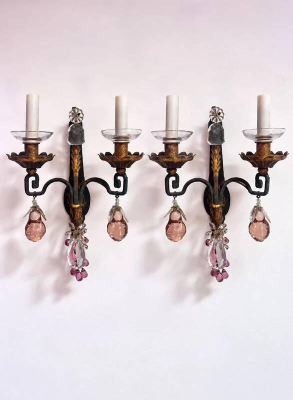 Maison Baguès, pair of wall sconces in wrought iron and gilded sheet metal, crystal pendants.
