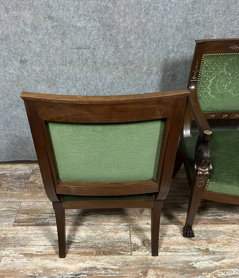 Pair of Empire-Consulate armchairs in molded and carved mahogany