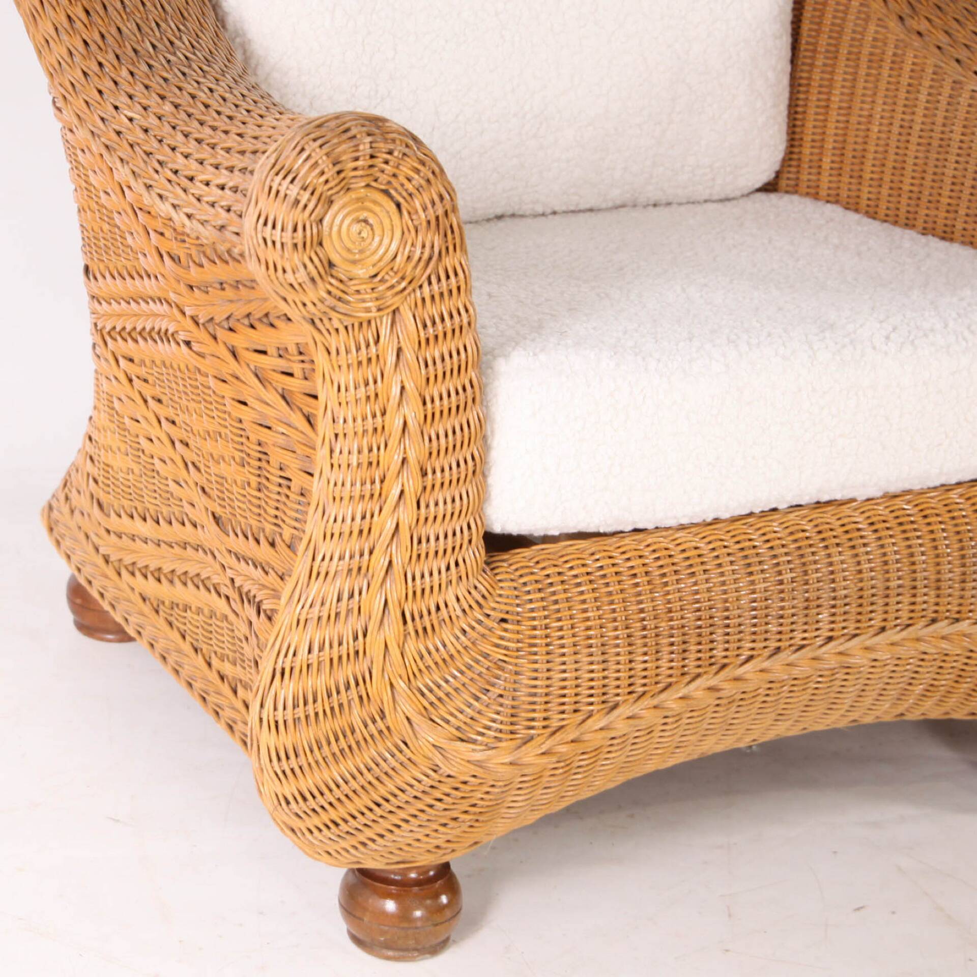 Pair of woven wicker armchairs