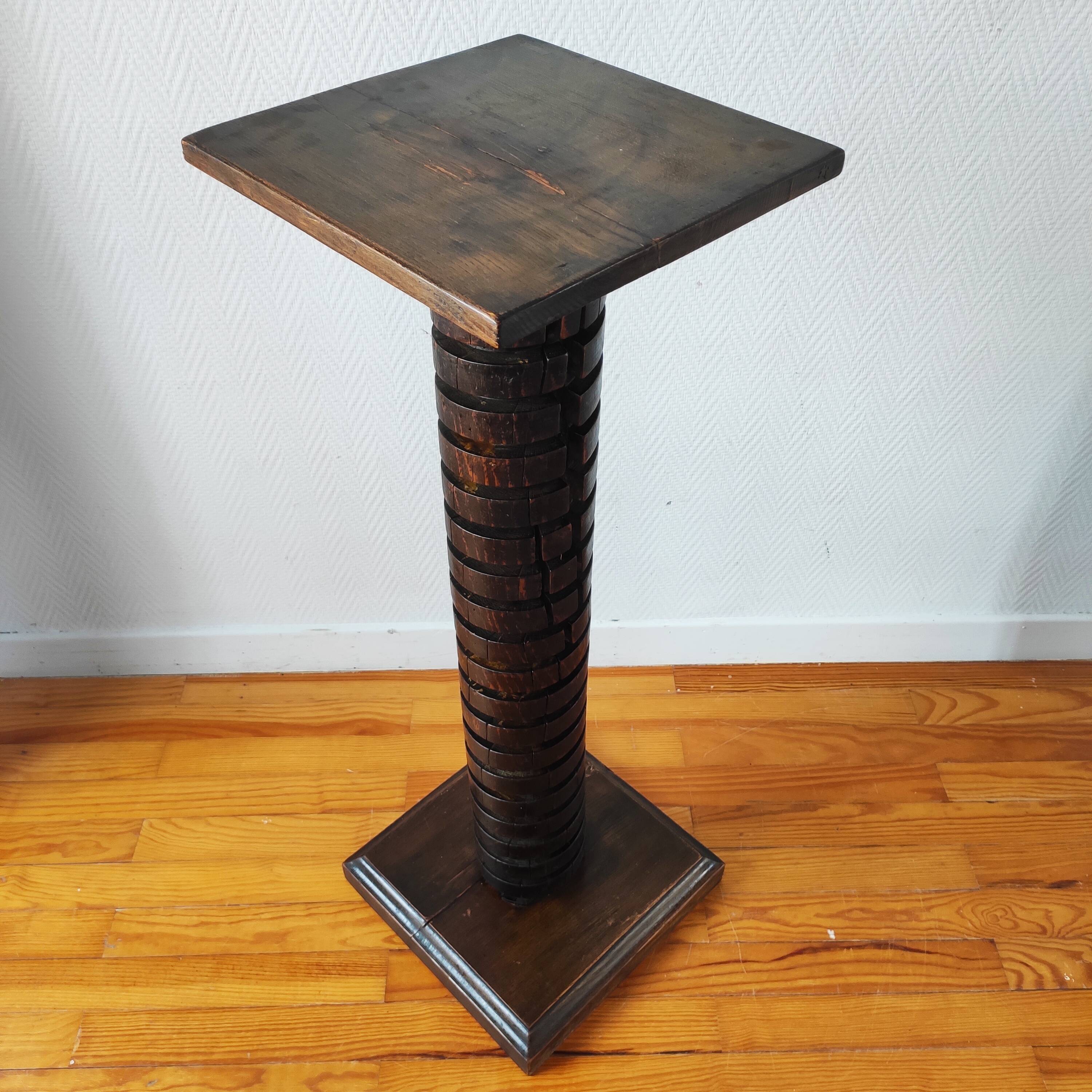 Brutalist column – old Burgundy press screw