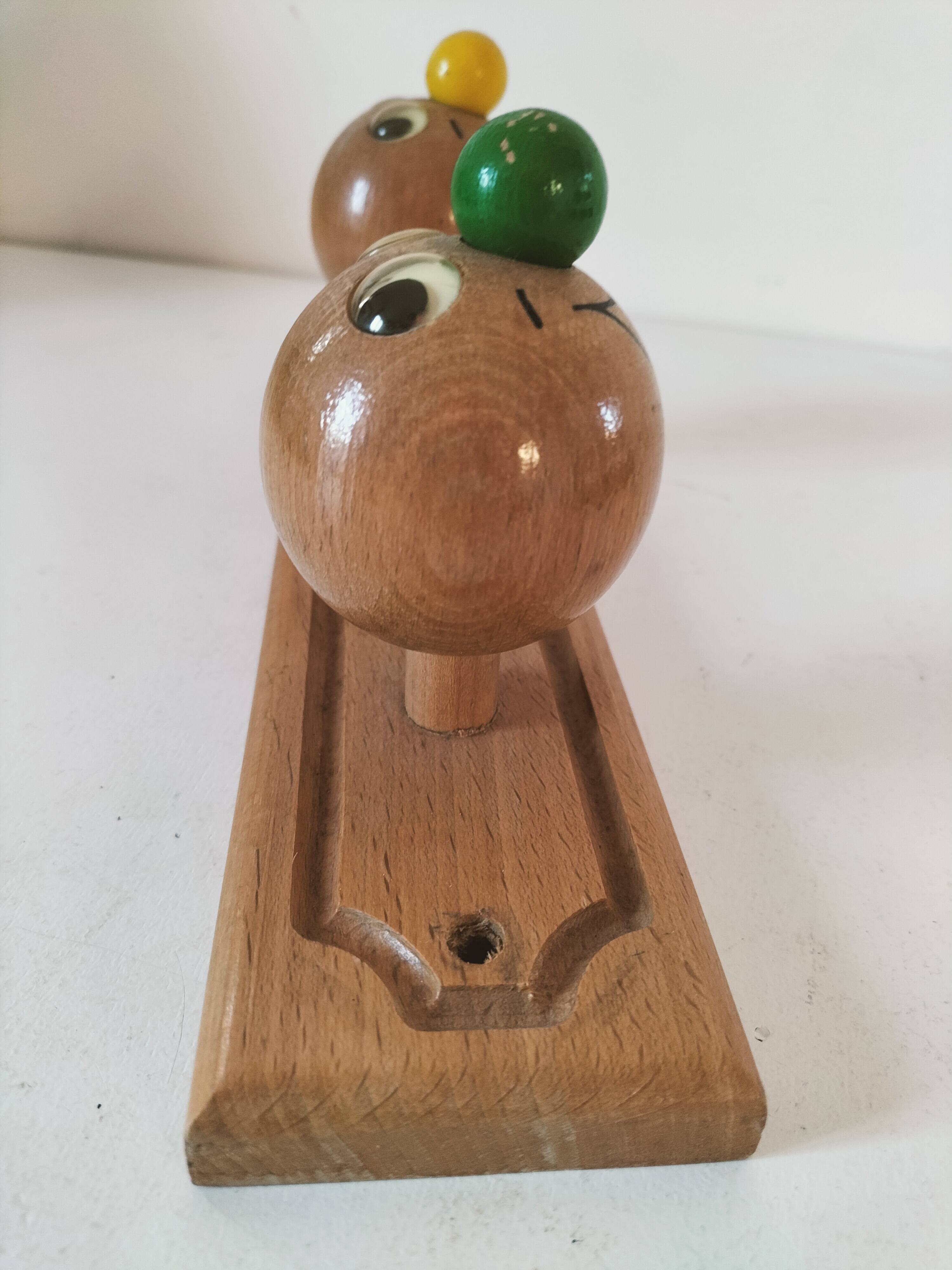 Vintage wooden children's coat rack - smiling heads hooks