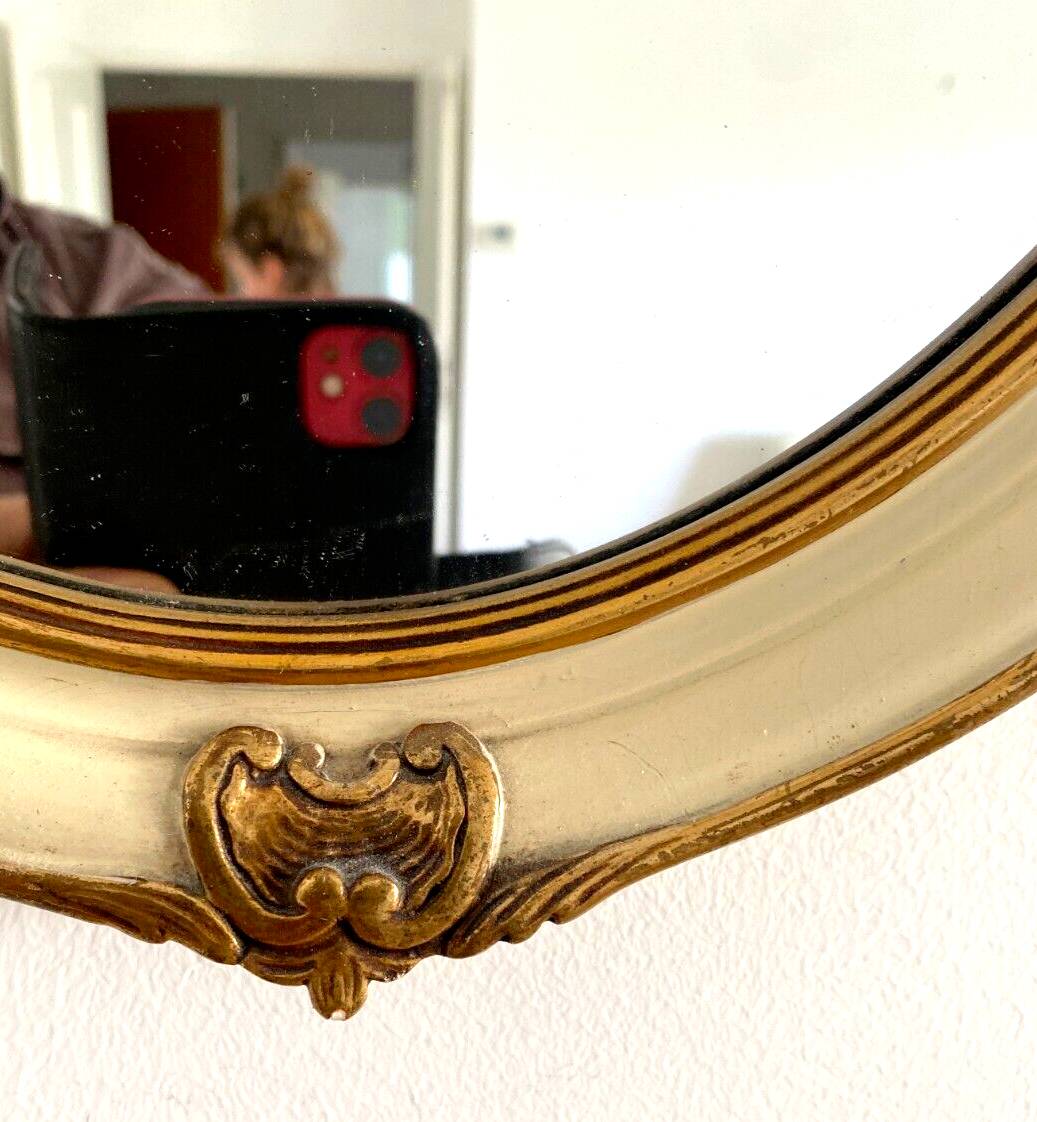 Mirror in wood and stucco with gilded highlights 20th century