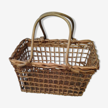 Basket has two handles in rattan