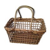 Basket has two handles in rattan