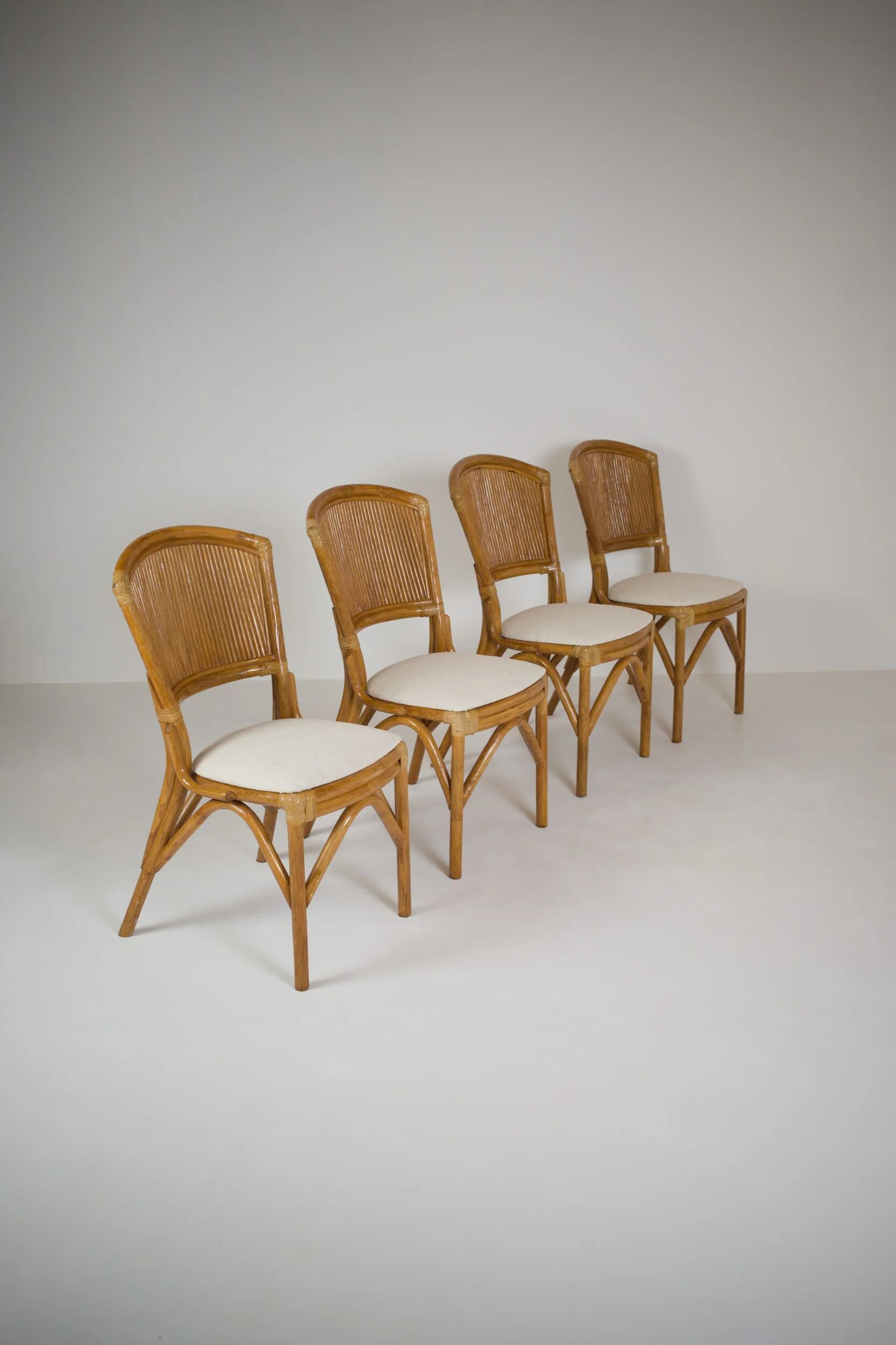 Ensemble table et 4 chaises vintage en rotin esprit Riviera