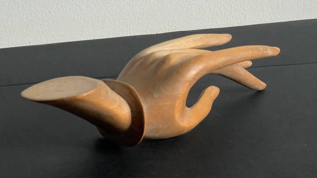 Wooden hand sculpture