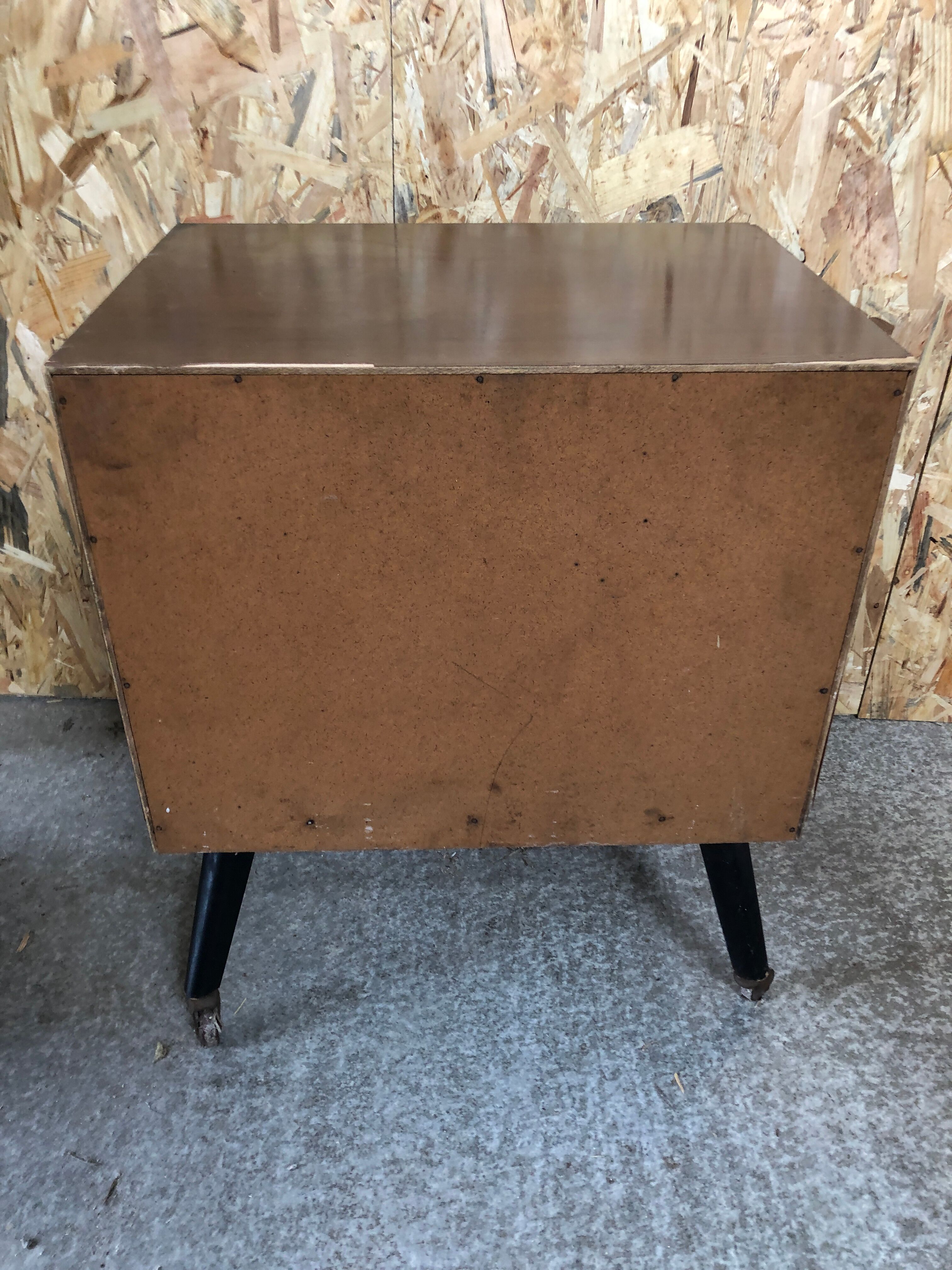 Old chest of drawers 4 drawers wood feet compass black + castors 70s vintage