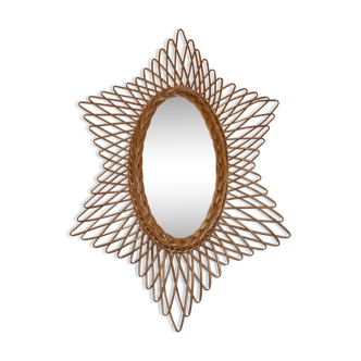 Miroir soleil ovale en rotin des années 60 taille 73x50cm