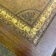 Victorian English extendable coffee table made of solid mahogany and leather.