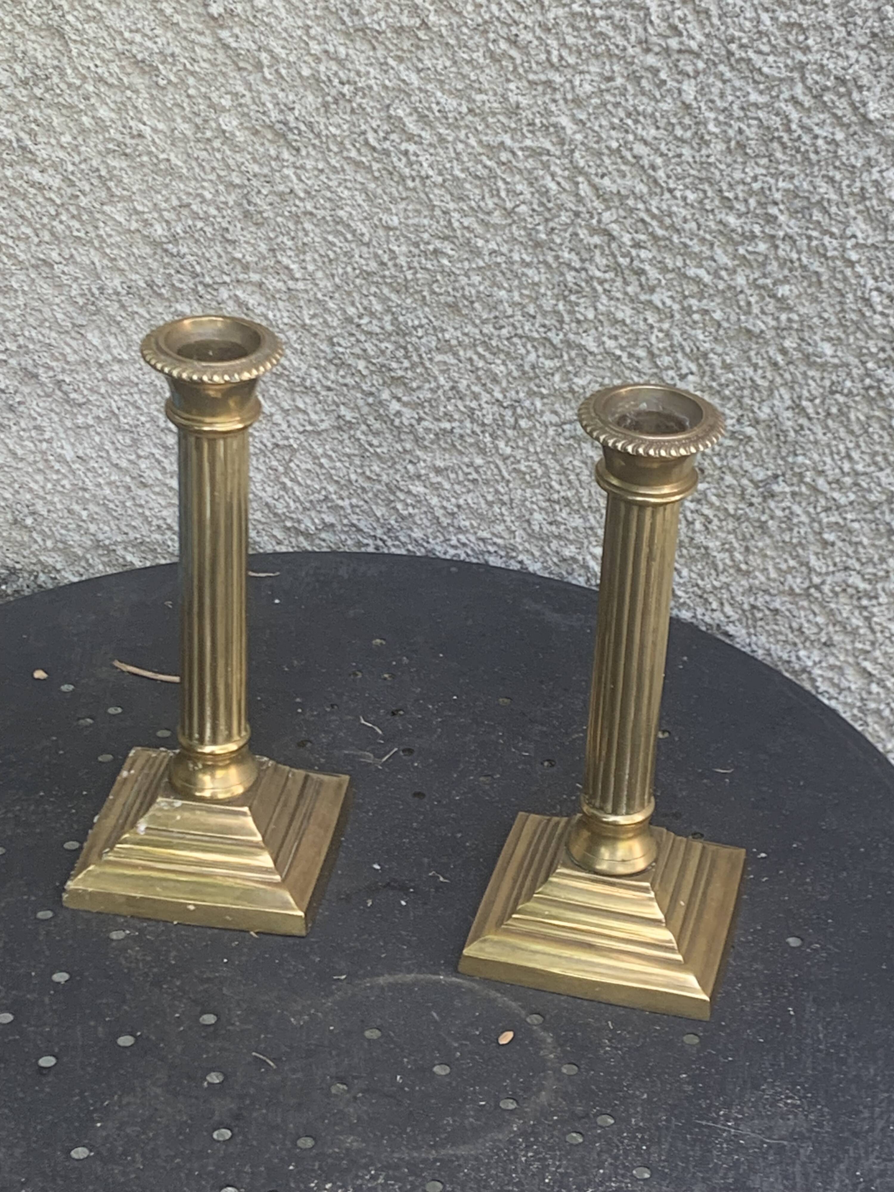 Pair of gilded brass candlesticks, vintage column shape