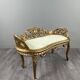 Louis XV style bench in carved and gilded wood, 20th century.
