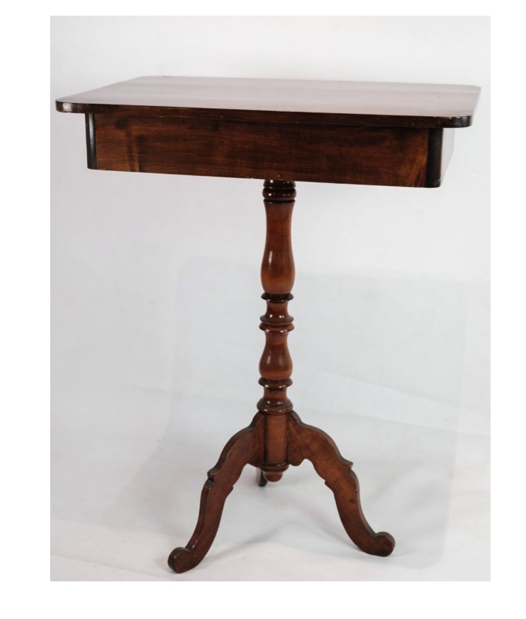 Side table on a mahogany pillar from around the year 1850s