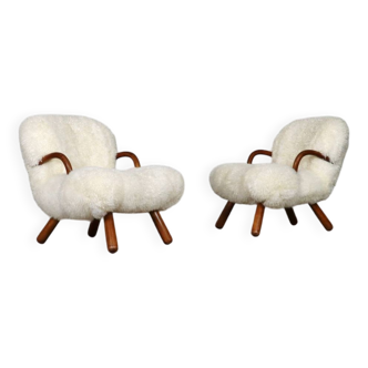 Early pair of arnold madsen clam chairs in curly sheepskin, madsen & schubell, 1944