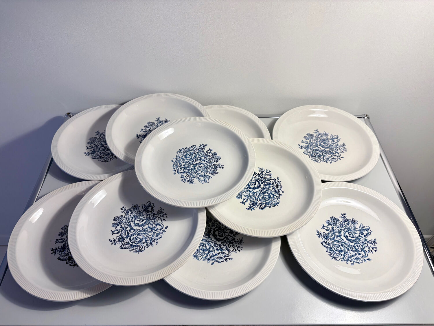Set of 10 antique Lunéville flat plates – blue floral decoration