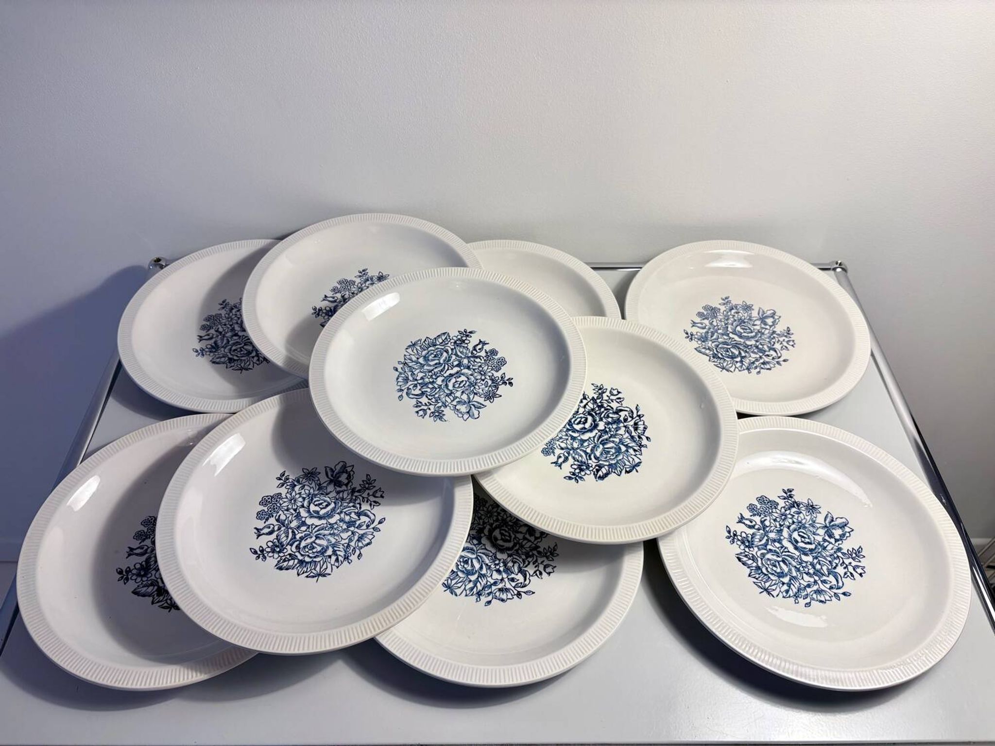 Set of 10 antique Lunéville flat plates – blue floral decoration