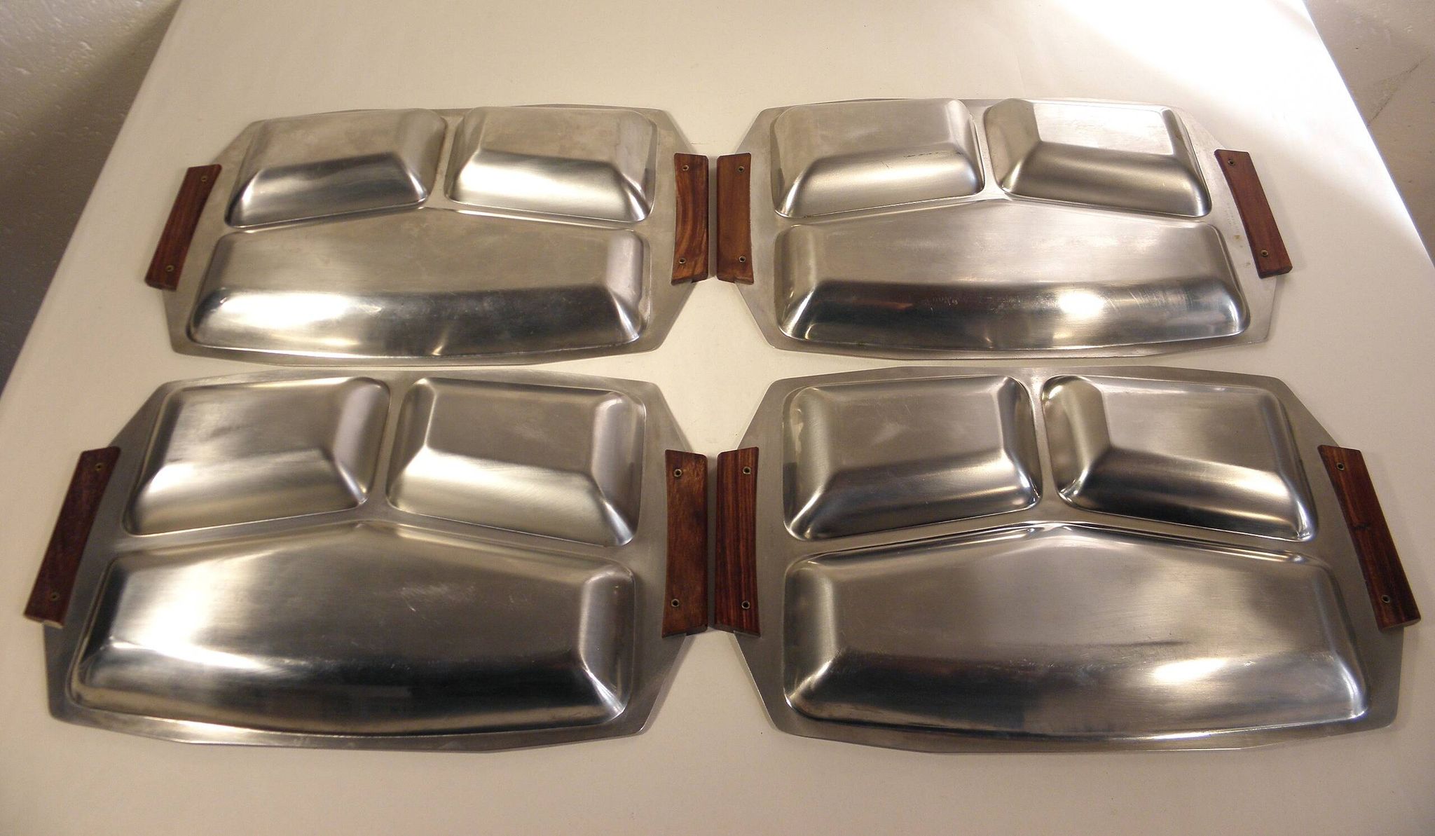 Set of 4 stainless steel and wood trays from the 70s