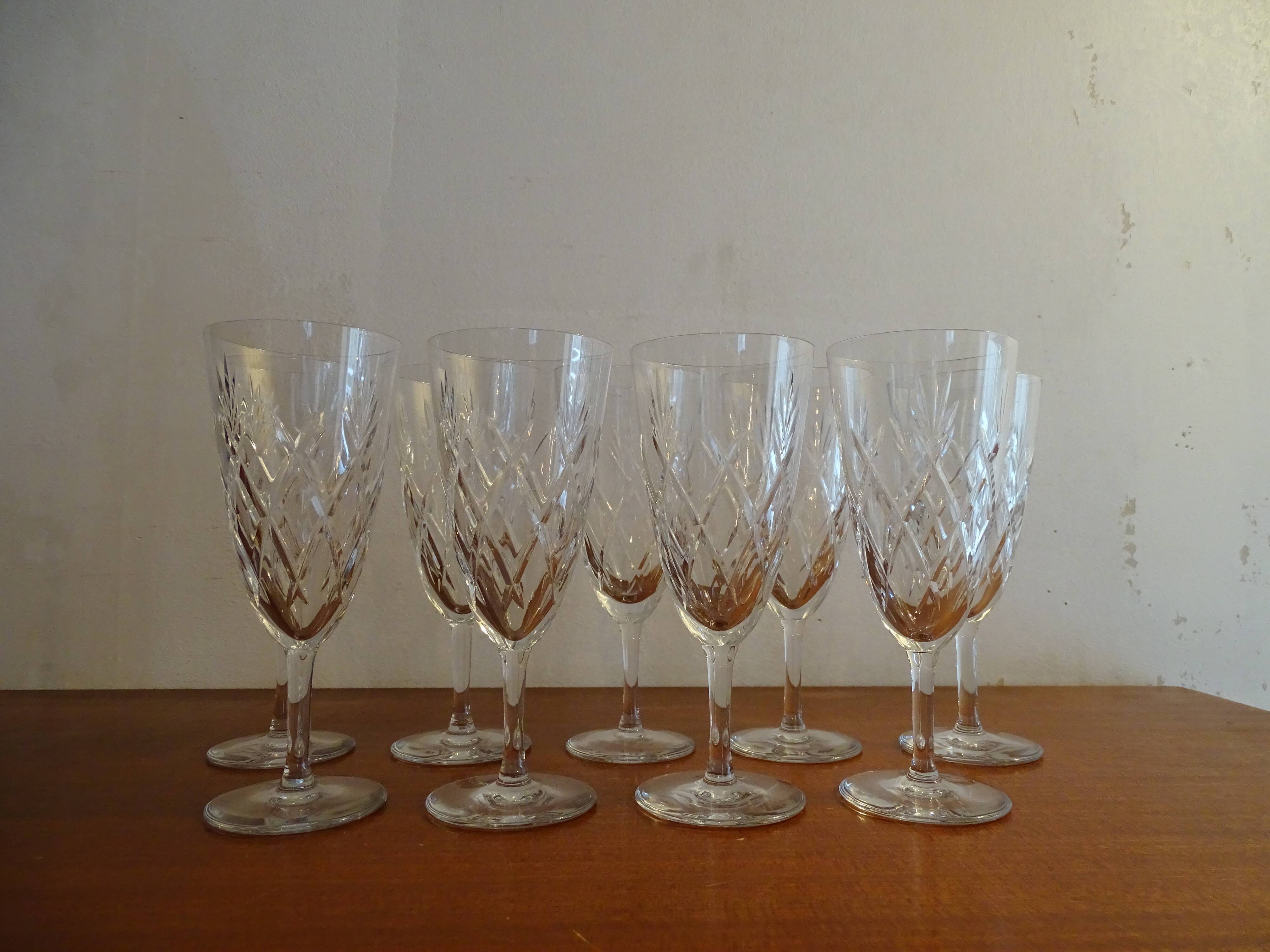9 Bayel crystal champagne flutes signed, cut crystal.