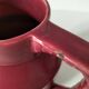 Old raspberry red pitcher from Onnaing, early 20th century.