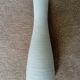 White ceramic vase with fine streaks