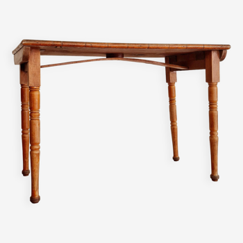 Old wooden table with turned legs - speckled top
