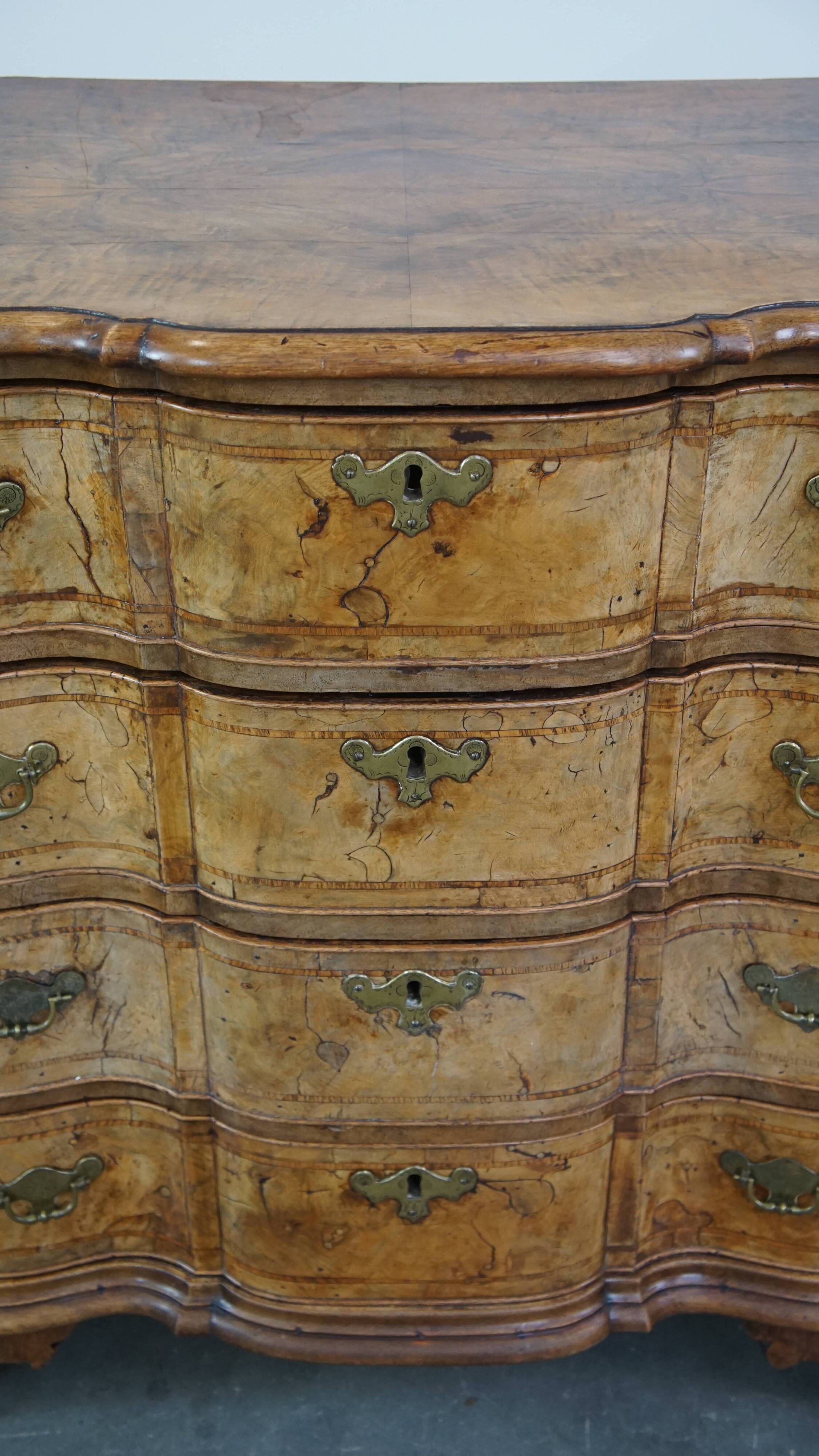 Baroque organ-bent walnut antique chest of drawers from the 18th century