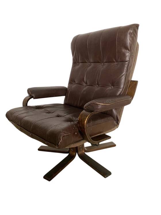 Vintage Scandinavian armchair in curved wood and leather