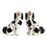 Pair of black Cavalier King Charles dogs in Staffordshire pottery, 19th century.