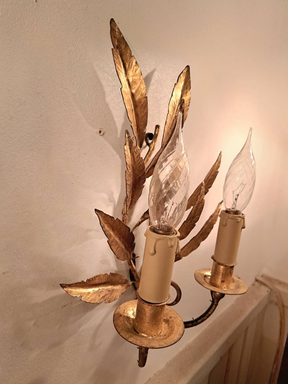 Pair of gold-tone metal leaf wall sconces