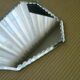 Bevelled hand mirror
