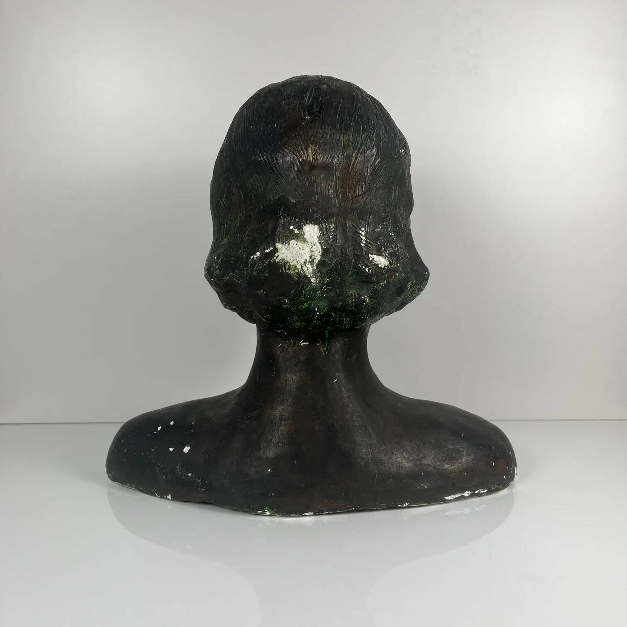 Female bust in neoclassical style in plaster by M. Mongey, 20th century.