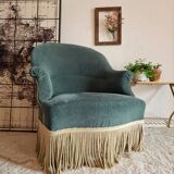Green velvet toad armchair with fringes