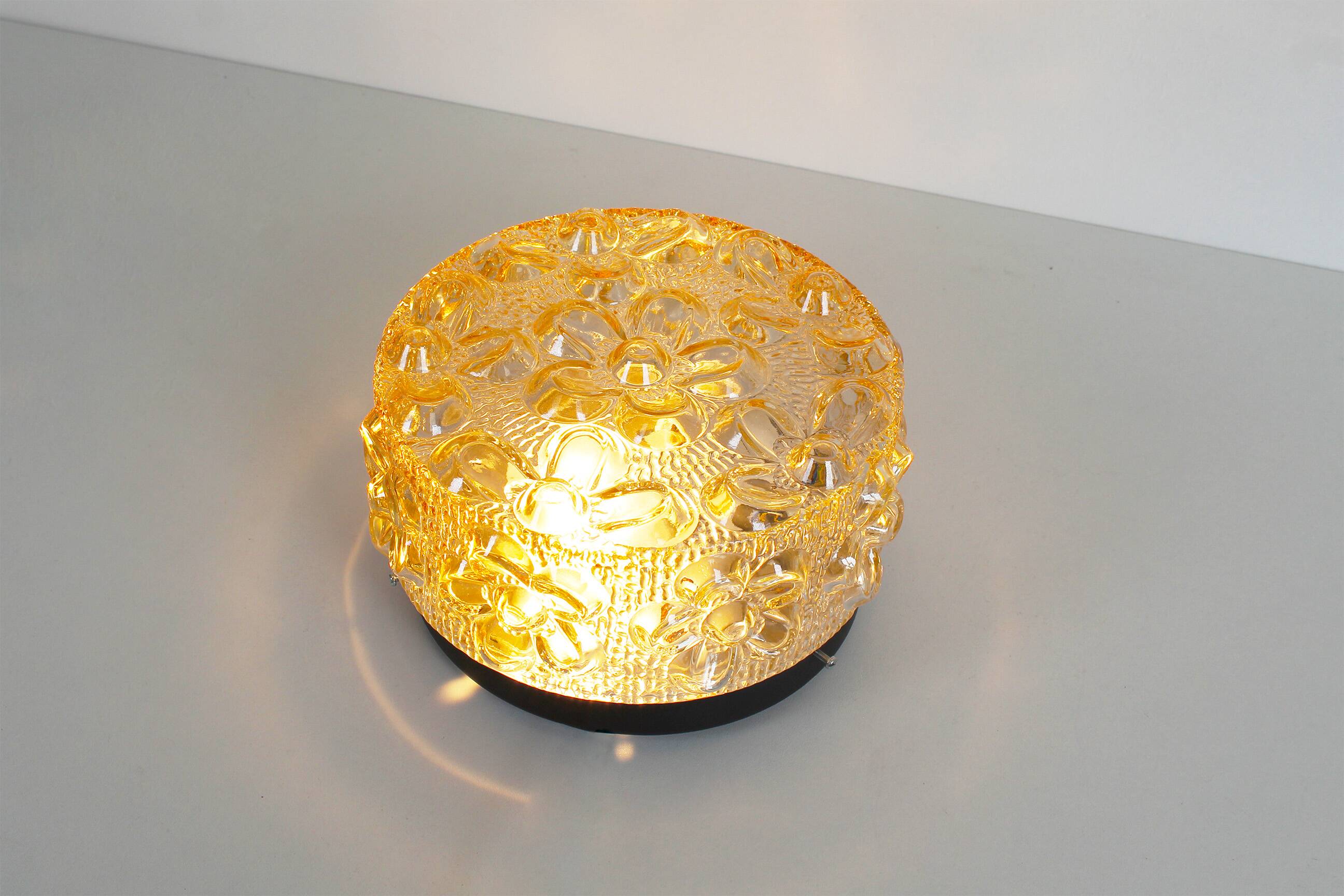 Original 1970’s amber Glass ‘Flower’ wall lamps by Erco