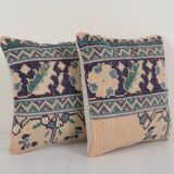 Set of two muted ecru carpet rug pillows