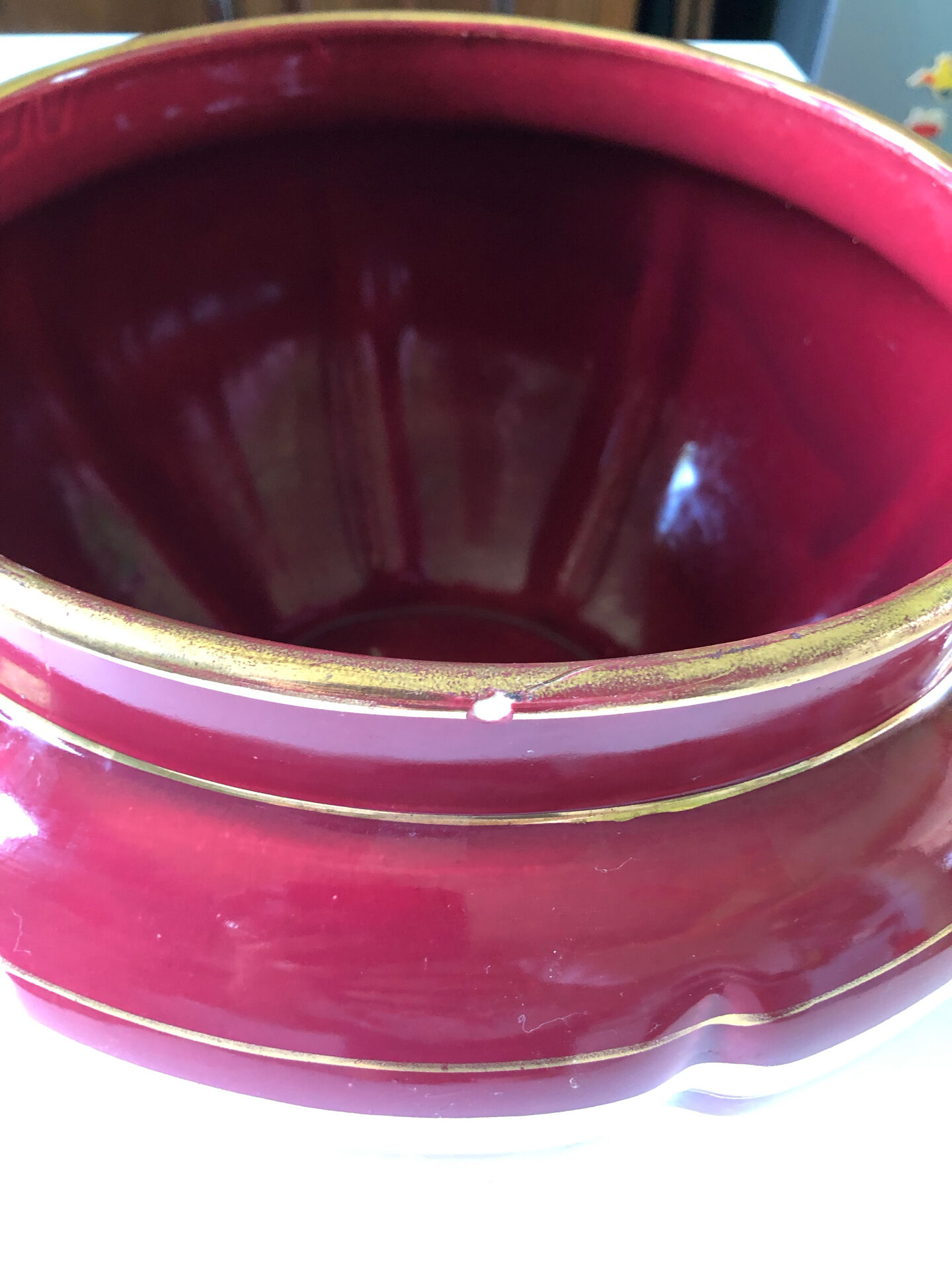 Large burgundy and gold vase