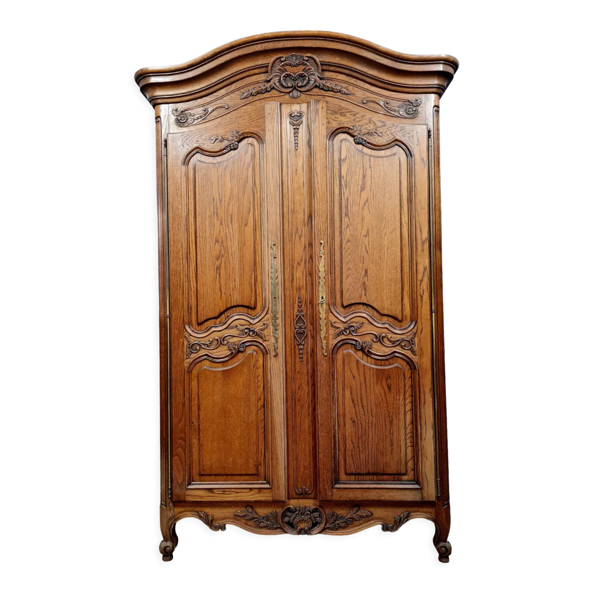 Louis XV style wardrobe with gendarme's hat in solid oak