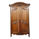 Louis XV style wardrobe with gendarme's hat in solid oak