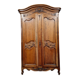 Louis XV style wardrobe with gendarme's hat in solid oak