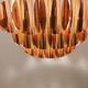 Copper colored hanging lamp. designed by thorsten orrling sweden