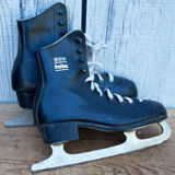 Old pair of black ice skates