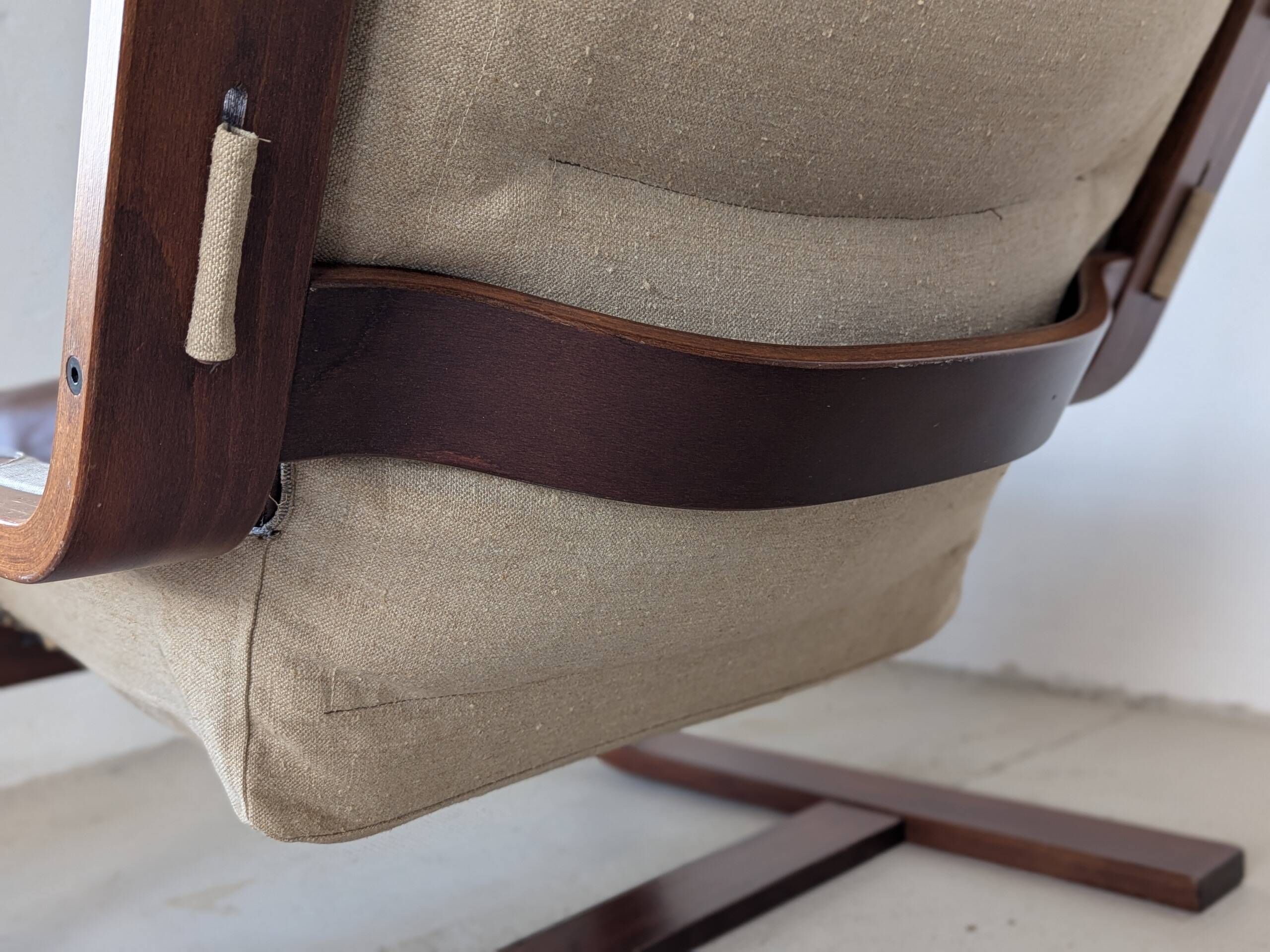 Leather and wood armchair, brutalist style.