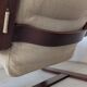 Leather and wood armchair, brutalist style.