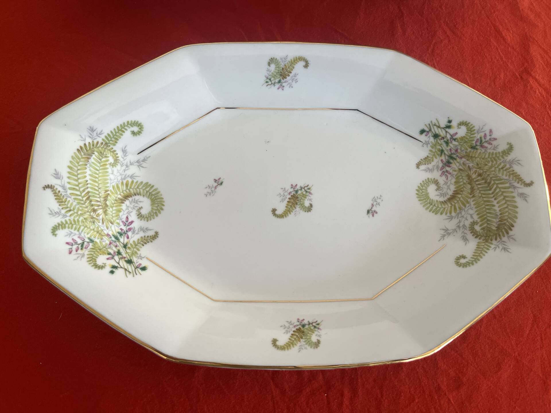 3 Limoges porcelain plates with a squirrel design.