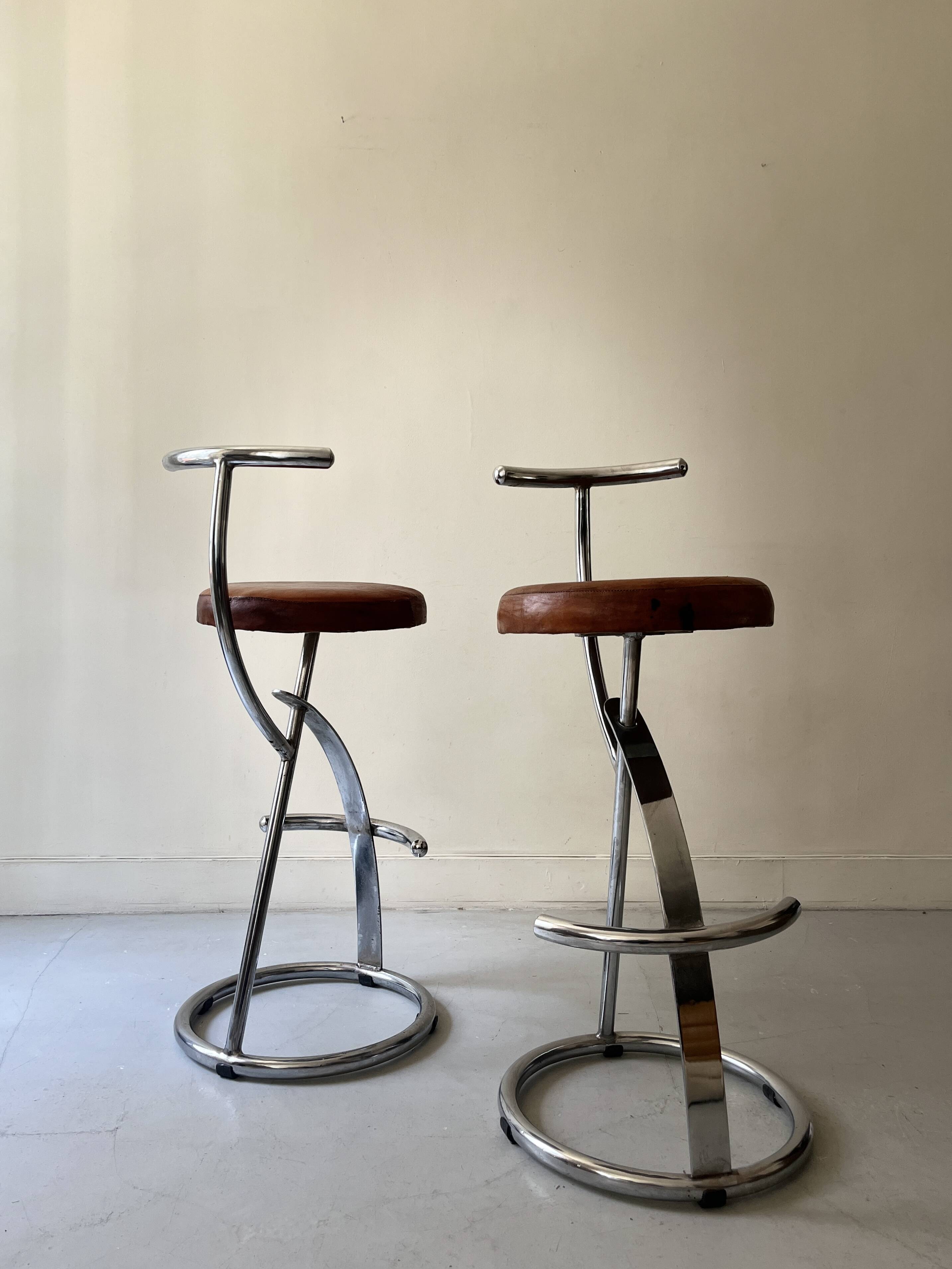Bar stools in tubular chrome and tan leather, 1970s