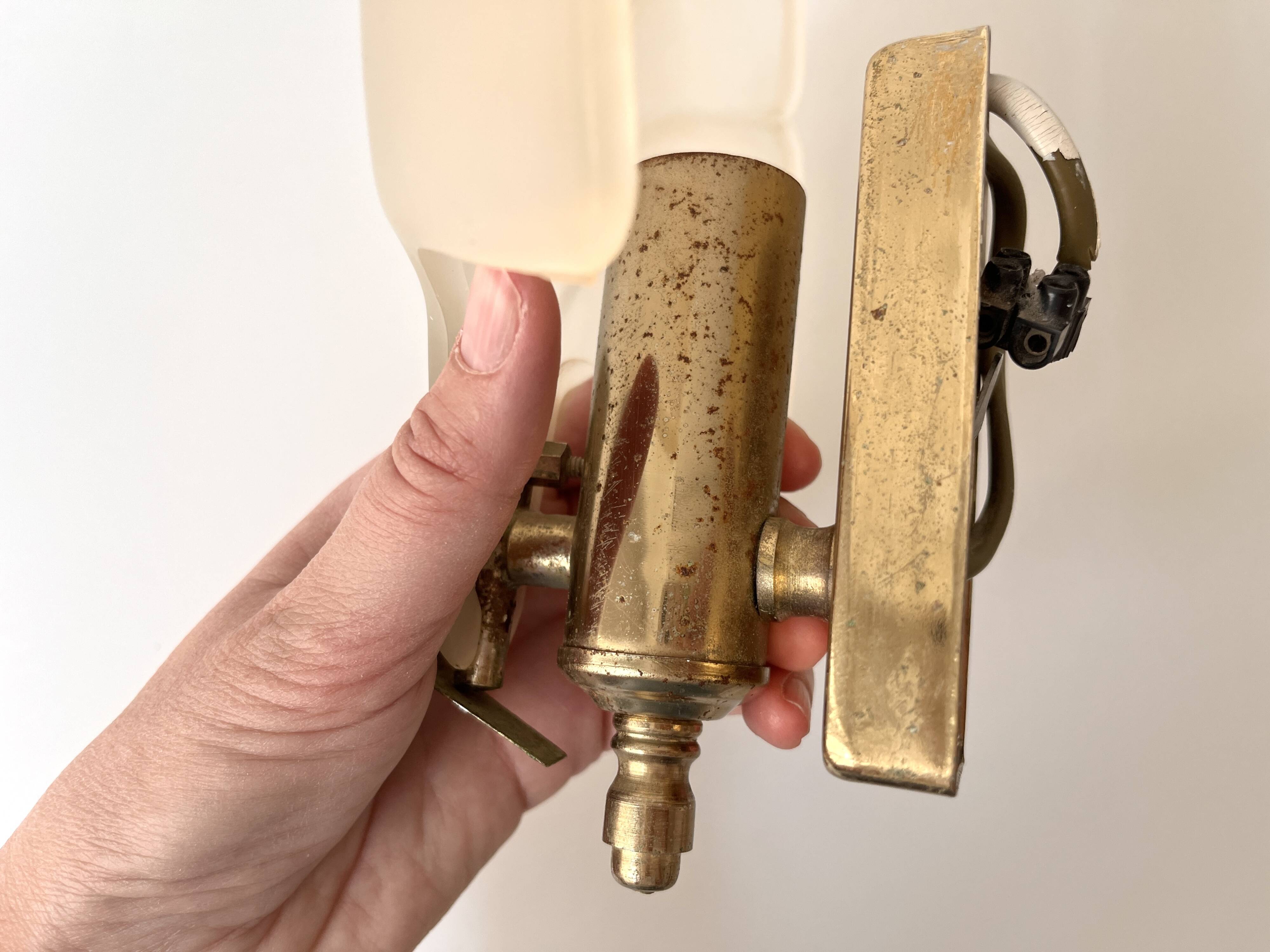 Pair of vintage shell glass wall lights, Art Deco style fixtures.