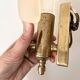 Pair of vintage shell glass wall lights, Art Deco style fixtures.