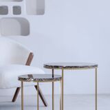 Trundle tables in imperial brown marble.